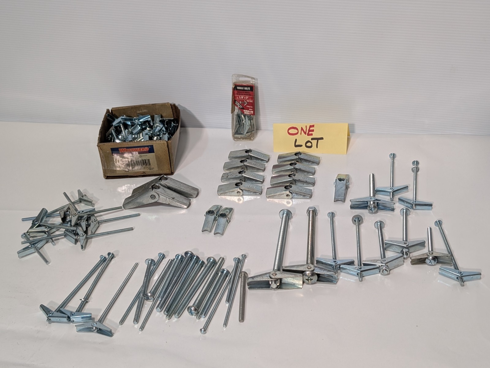 Large Lot of Assorted Sized Hollow Wall Mounting Toggle Bolts Pre-Owned as shown