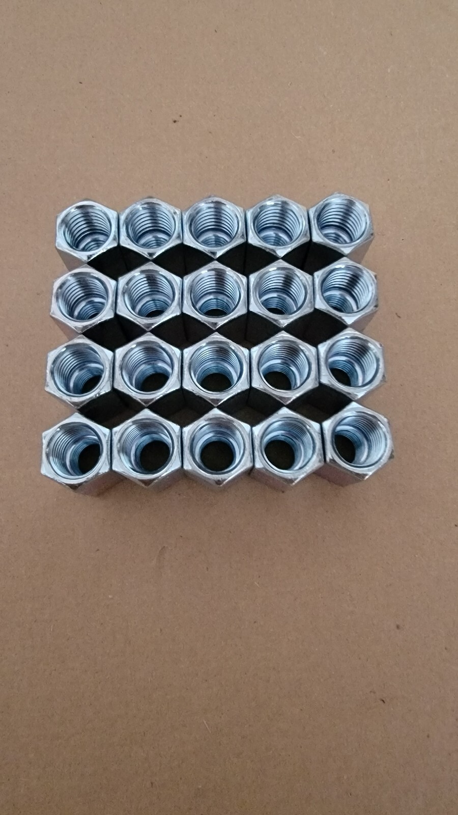 20 peices 5/8-11 to 1/2-13 x 1 1/4″ Long Reducer Coupling Nut – Zinc Plate