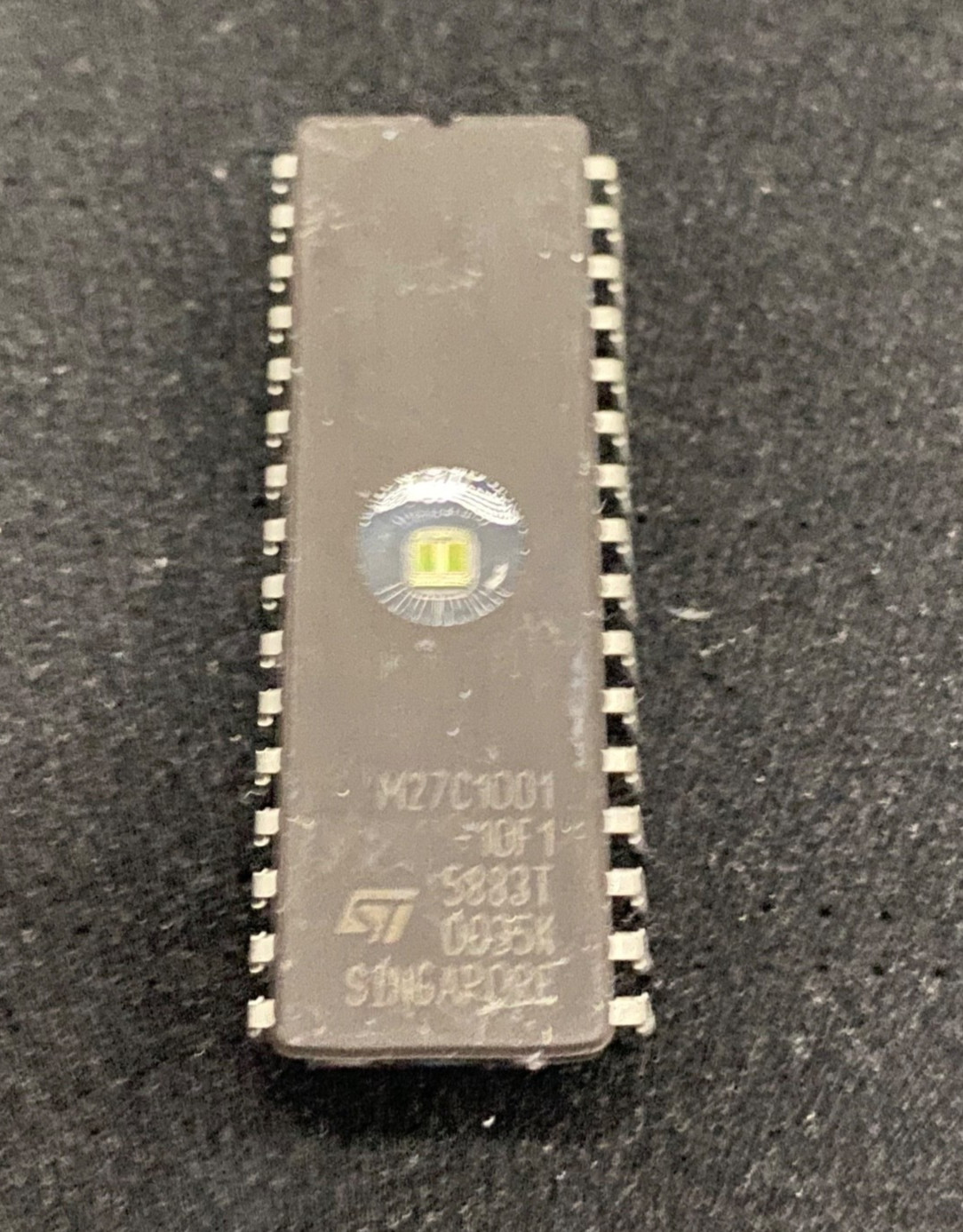 STMicroelectronics M27C1001-10F1 UV EPROM memory integrated circuit dates Vary