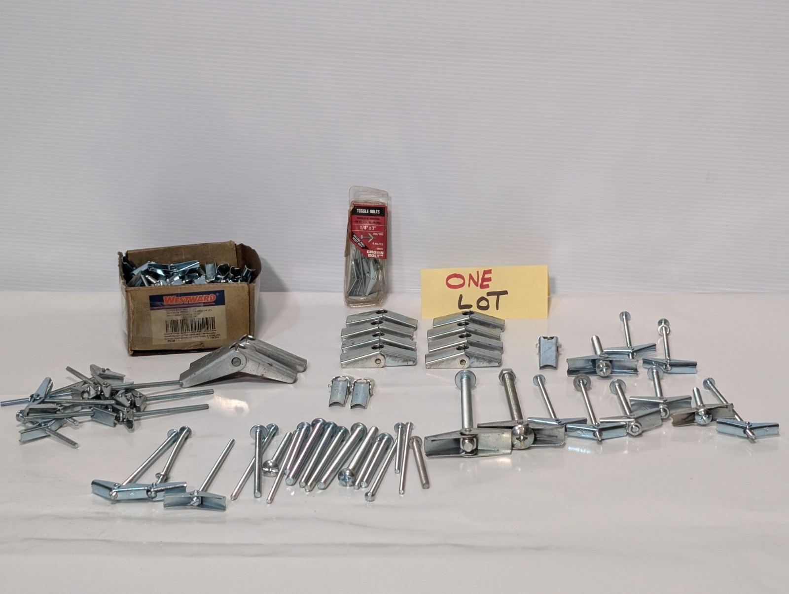 Large Lot of Assorted Sized Hollow Wall Mounting Toggle Bolts Pre-Owned as shown