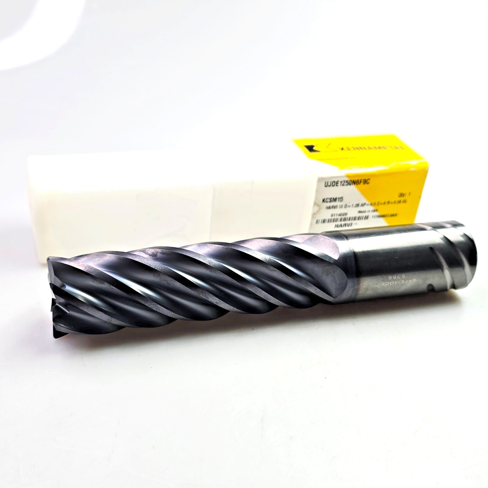 Kennametal 1-1/4″ x 1.25 x 4 x 7 R.06 Solid Carbide End Mill UJDE1250N6FBC