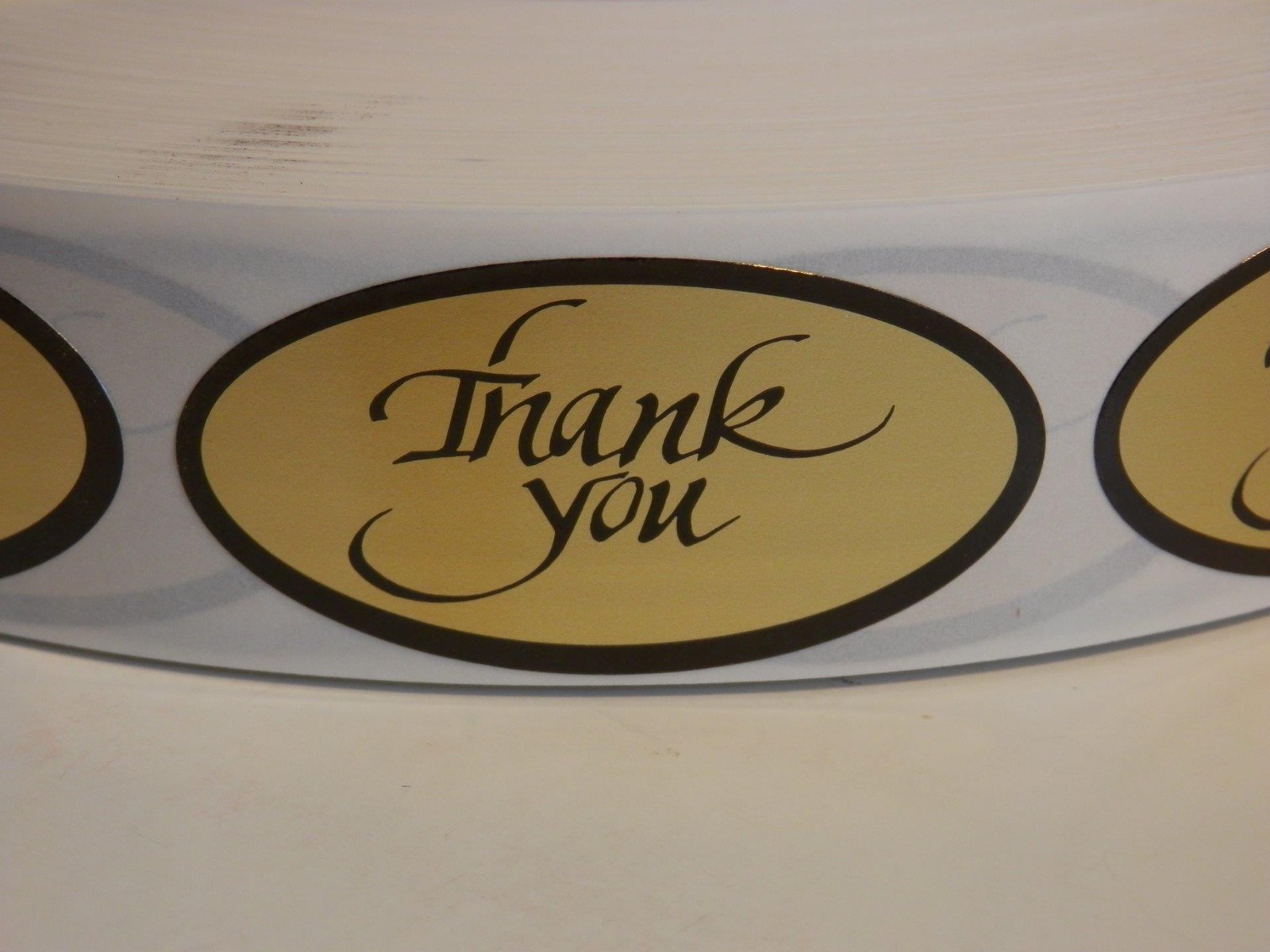 THANK YOU 1×2 oval Sticker Label matte gold foil bkgd 250/rl