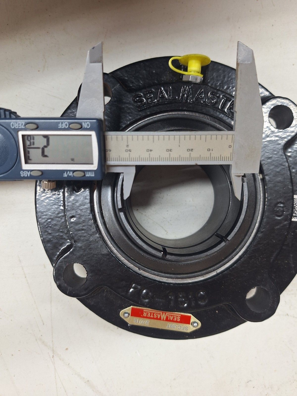 Sealmaster SFC-39T Flange Mount Bearing. 2 7/16 inch bore Squeeze Lock