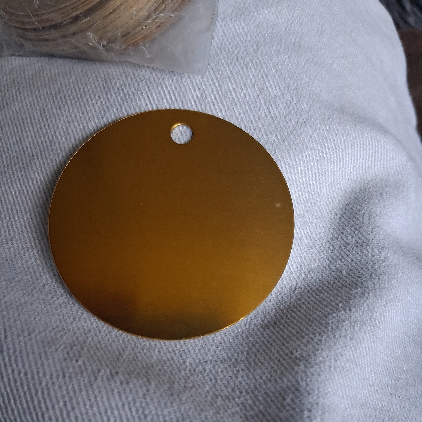 Brass Tags – 2 inch Circle Pk/25 NAP brand hole drilled new. no