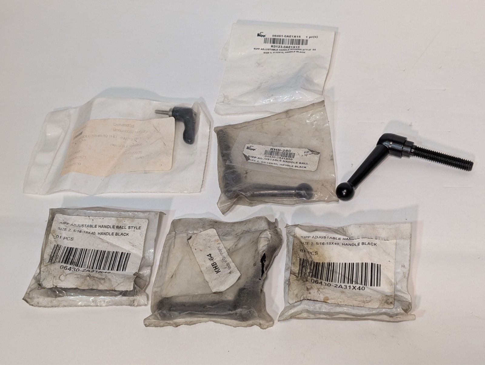 Lot of 7 KIPP K0123.0AE1X15, KHB-280, KHB-64 adjustable ball handles as shown