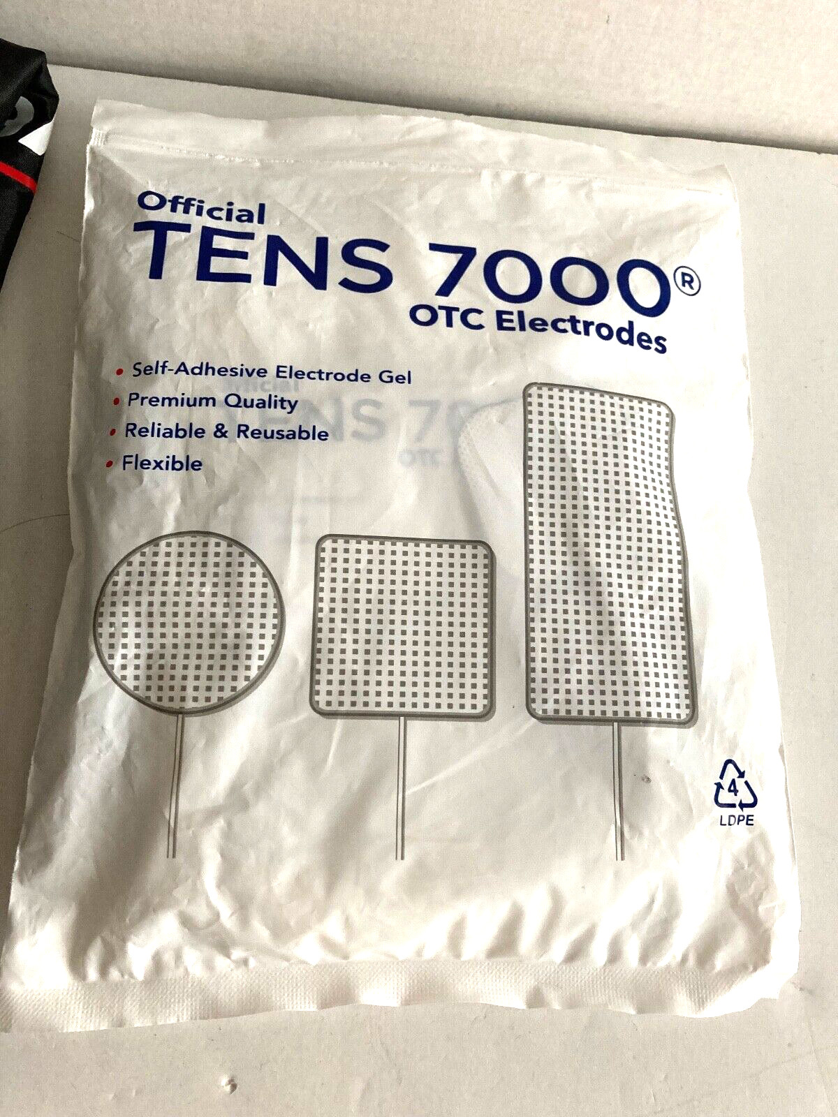 NEW Tens 7000 With Accessories and Official OTC Electrodes