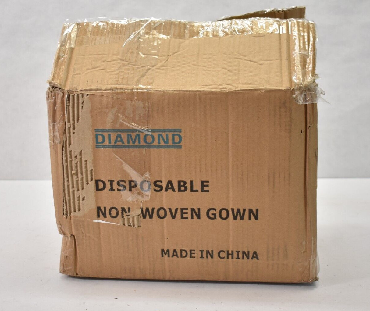 Lot of 50 Diamond Disposable Non Woven Gowns ISLGND Exp 12-2025 Yellow