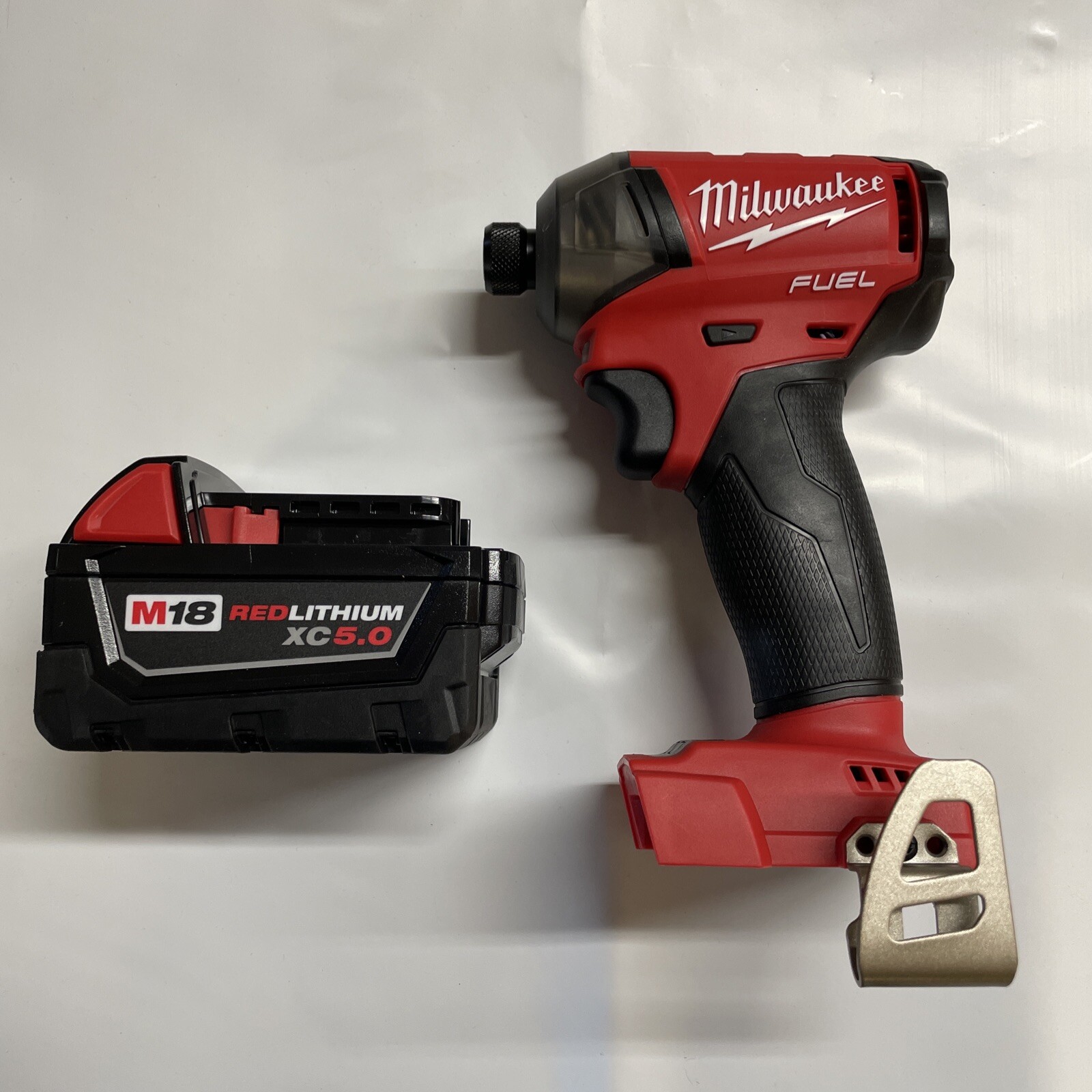 Milwaukee 2760-20 M18 Fuel Lithium 1/4 Surge Impact w/ 5 Amp Battery NEW