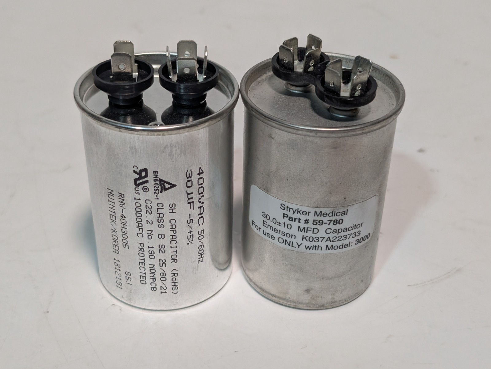 (2) Capacitors: Stryker Medical 59-780/Emerson K037A223733; SH RNV-40H3005, 30μF