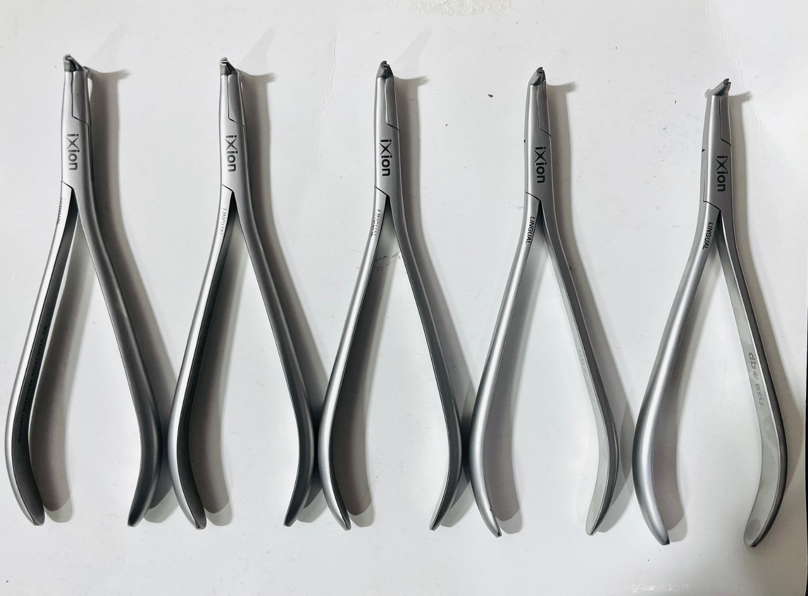 5 PCs DB orthodontics ixion ix953 Cinch Back Plier dental Instruments