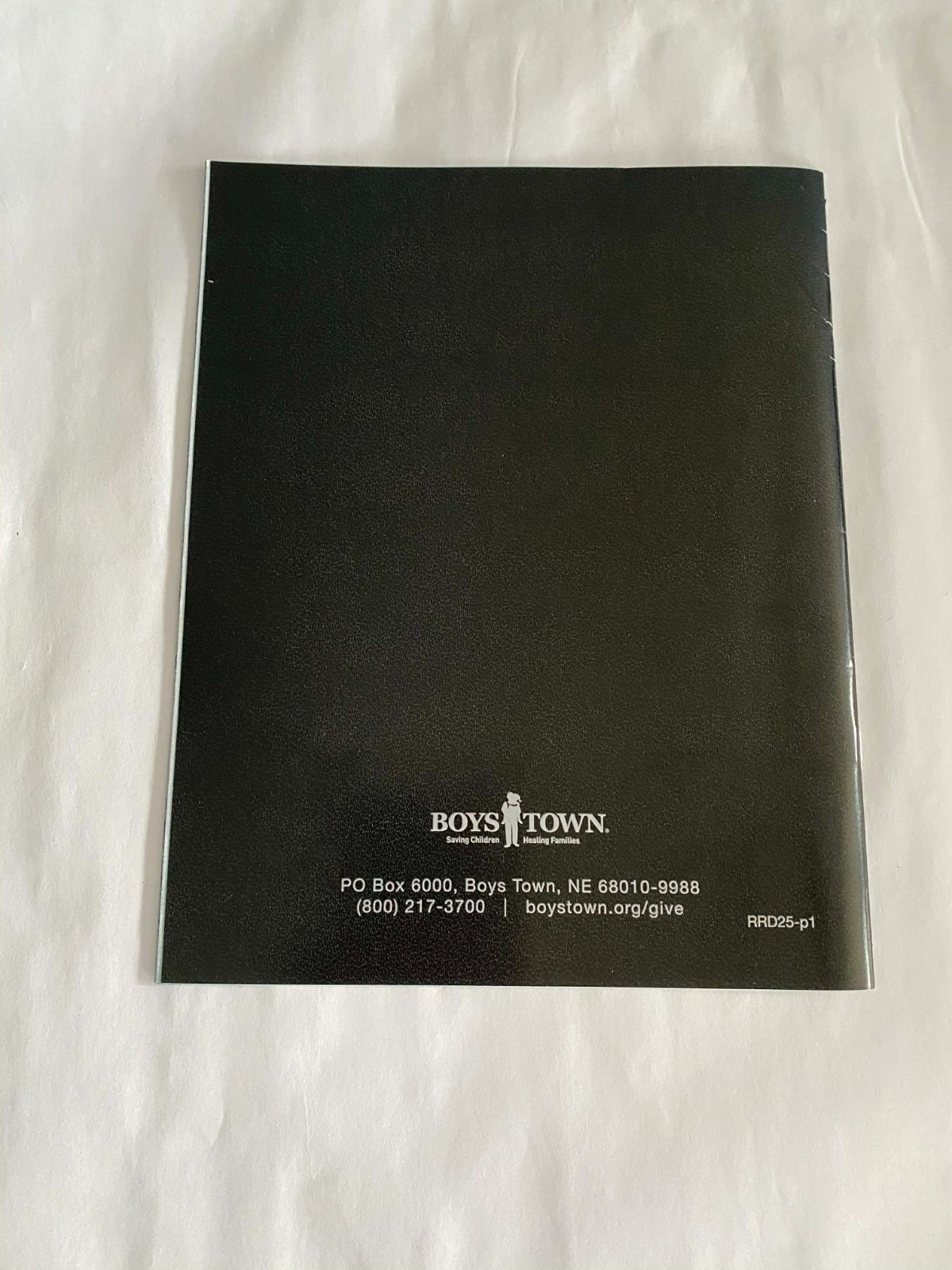 2026 PLANNER FROM BOYS TOWN – IN the BACK IT HAS 2026 & 27 MONTHS & HOLID Unused
