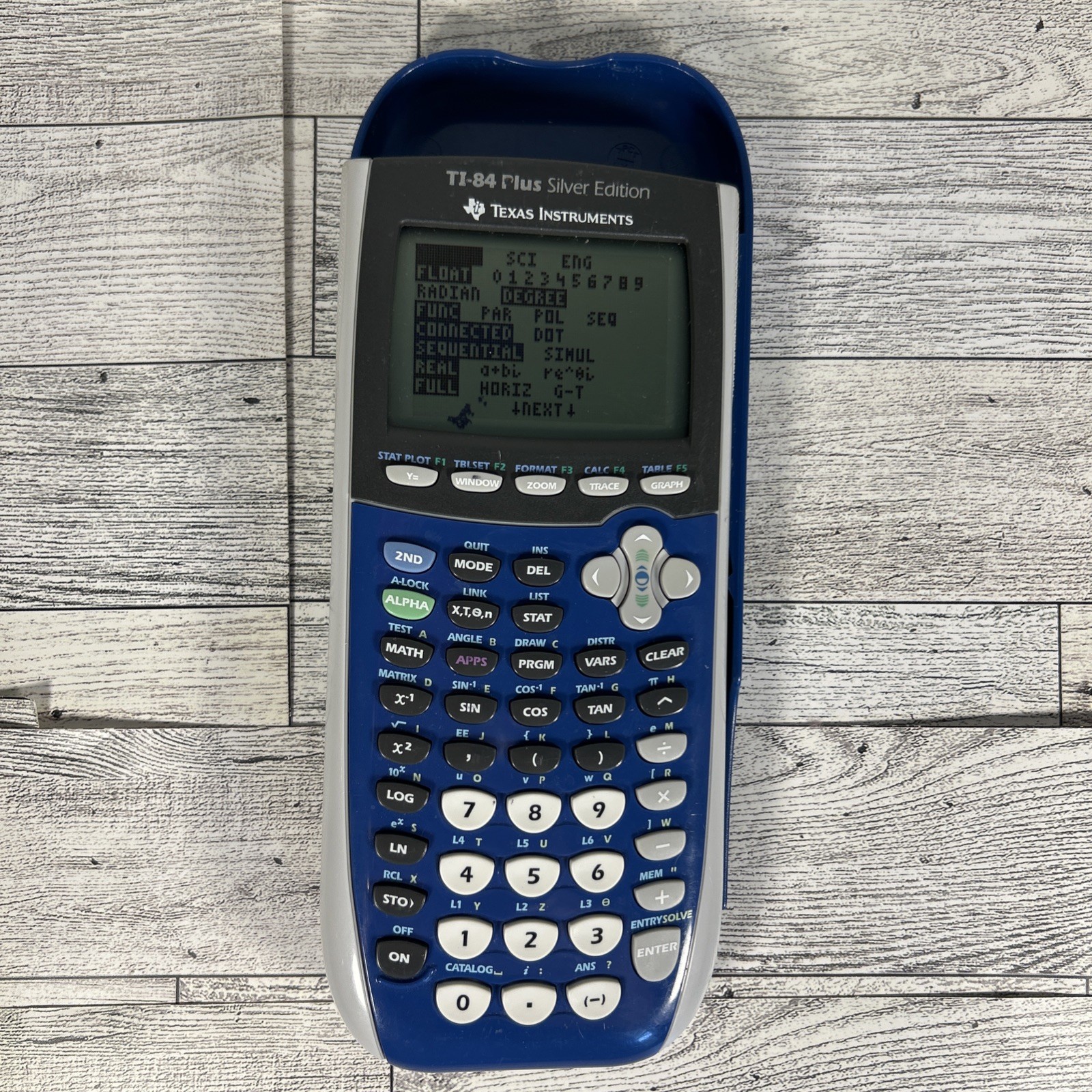 Texas Instruments TI-84 Plus Silver Edition Graphing Programmable, Blue Cover