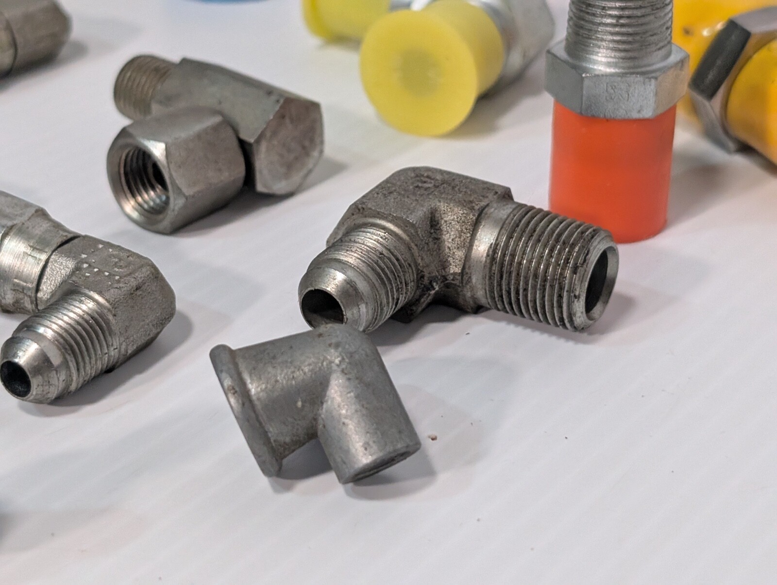 Mixed Lot of Female & Male Swivel Nut Elbow & Industrial Plug Fittings, as shown