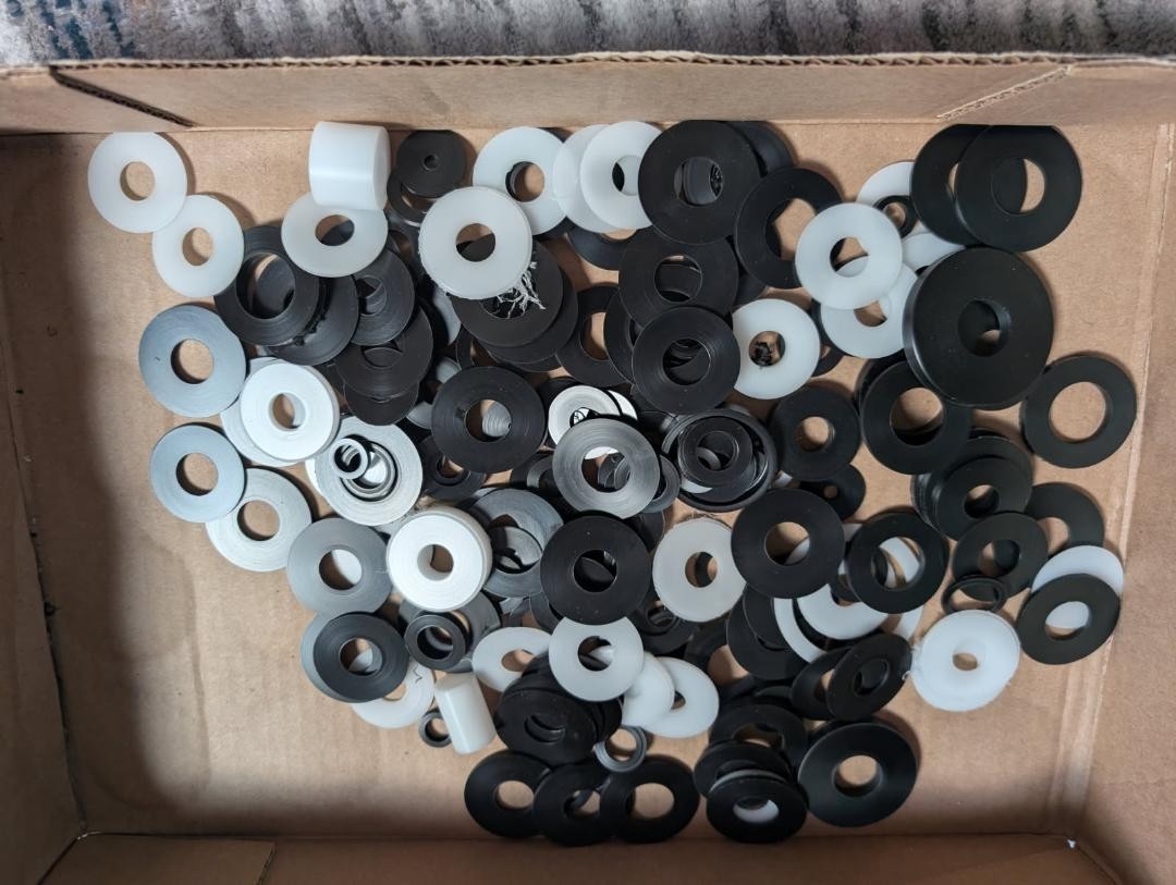 Lot of 150 assorted delrin/ acetal washers, black and white, variety of sizes