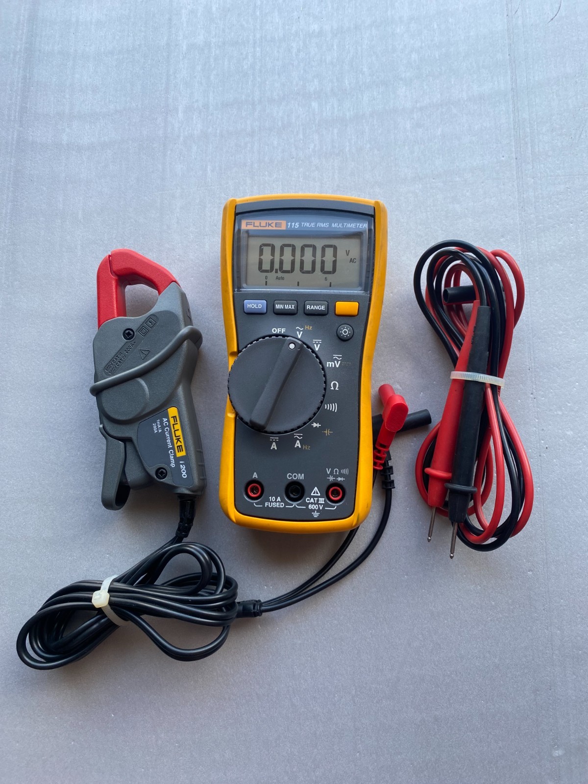 Fluke 115 True RMS Multiple 600V with Fluke i200 AC Current Clamp 1mA/200A