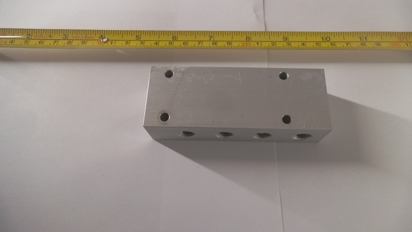 Aluminum 9 port distribution manifold 1/4 npt in, 1/8 npt x 8 out, 4 x 1-1/2 x 1