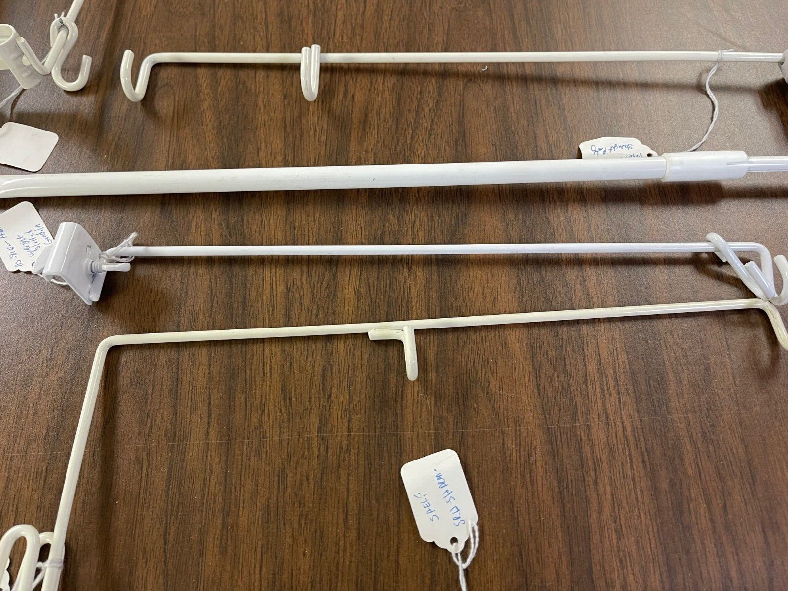 9 pieces Misc. Retail Shelving Metal Hardware- Flag Sign Holders