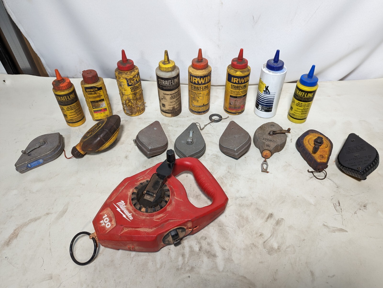 Lot of 9 chalk lines and 3.2 lbs of chalk: Milwaukee 48-22-3910, others