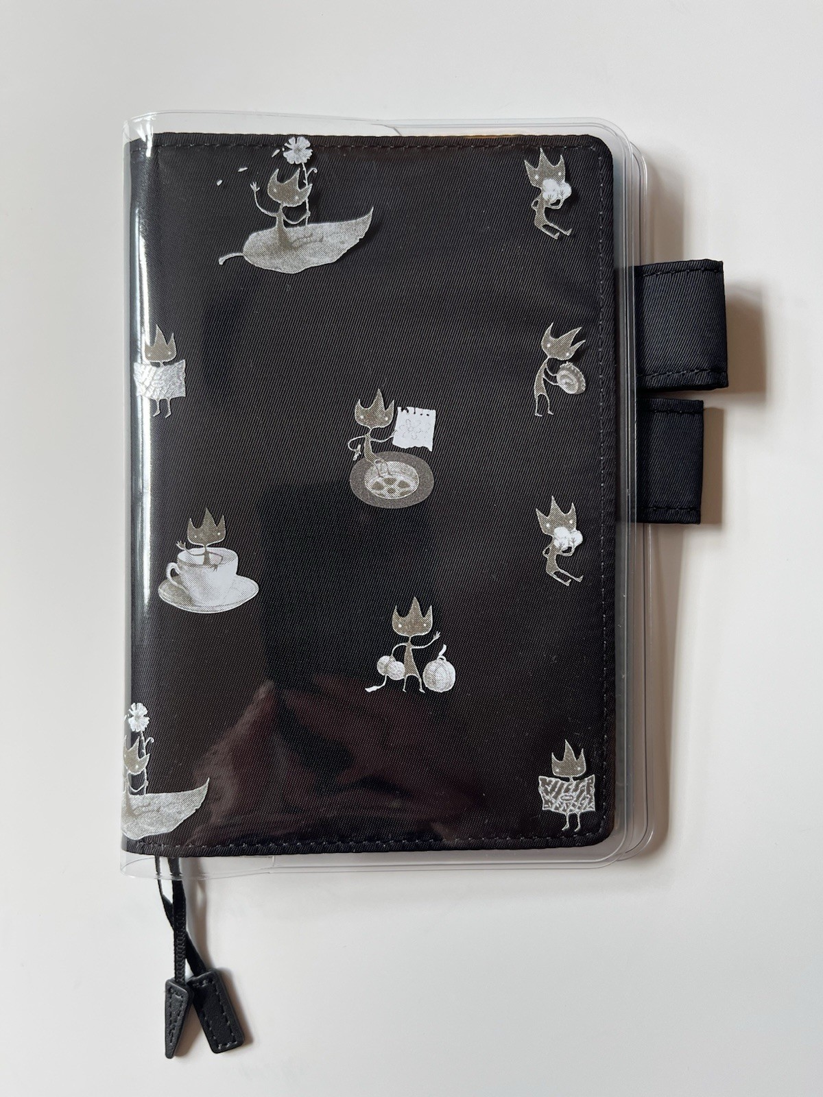 Hobonichi A6 Cover (Black/Blue) And “Eric” Shaun Tan Cover On Cover