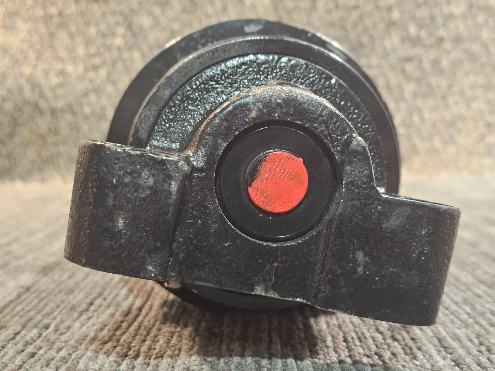 Sany 11899729 Carrier Roller, Black Powder Coated Finish