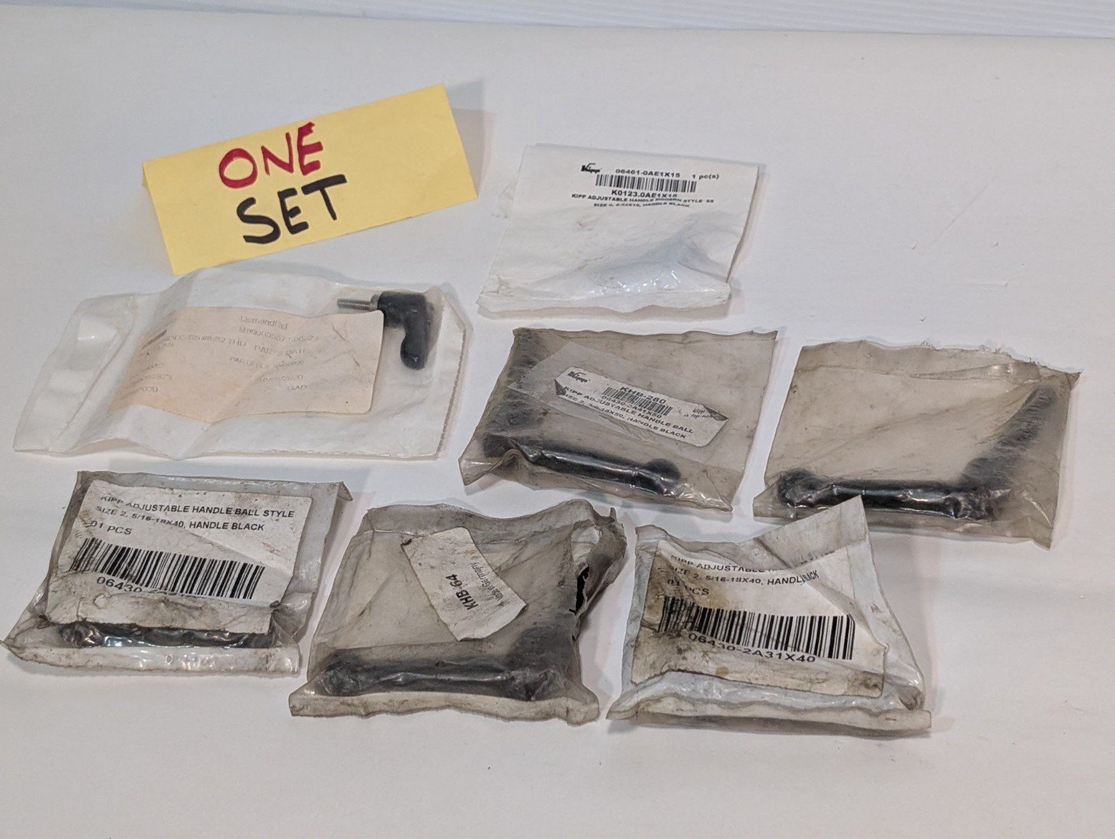 Lot of 7 KIPP K0123.0AE1X15, KHB-280, KHB-64 adjustable ball handles as shown