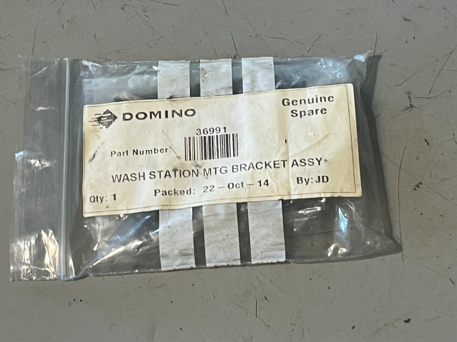 Domino, Wash Station Bracket Assy, 36991