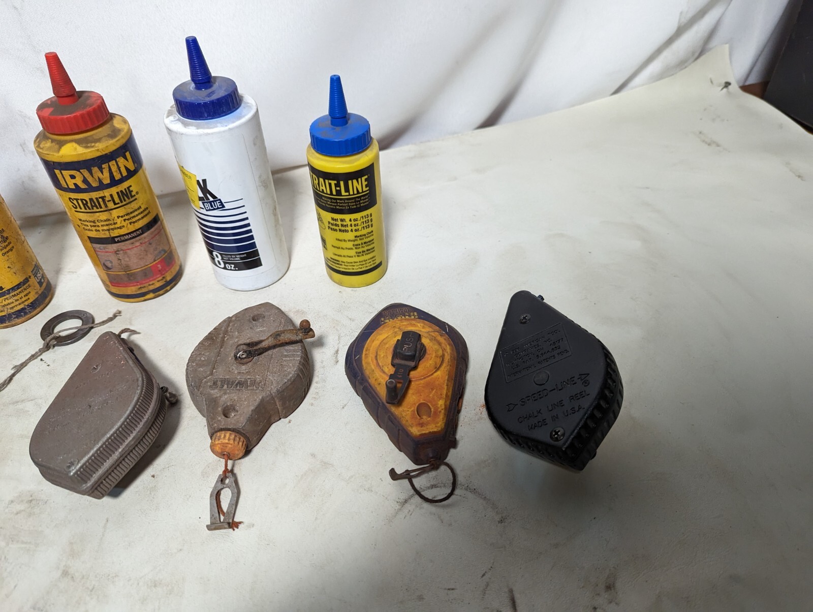 Lot of 9 chalk lines and 3.2 lbs of chalk: Milwaukee 48-22-3910, others