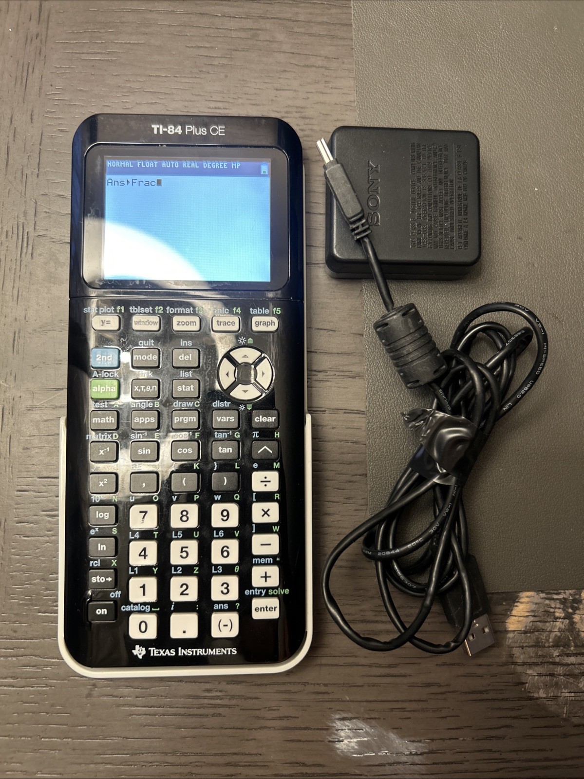 Texas Instruments Ti 84 Plus Ce Graphing Calculator – black charging cable &case