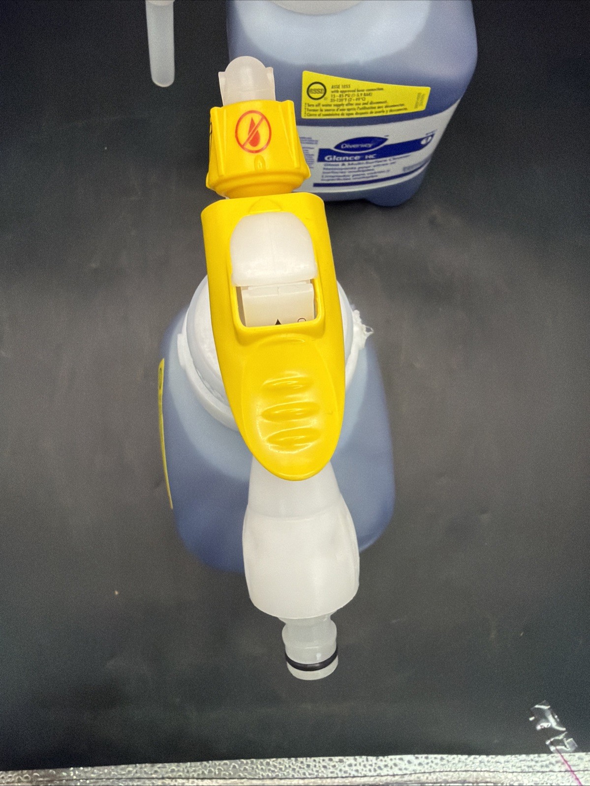 2 Bottles Diversey Glance HC 1.5L Glass/Multi-Surface Cleaner ( SKU 93063402 ).