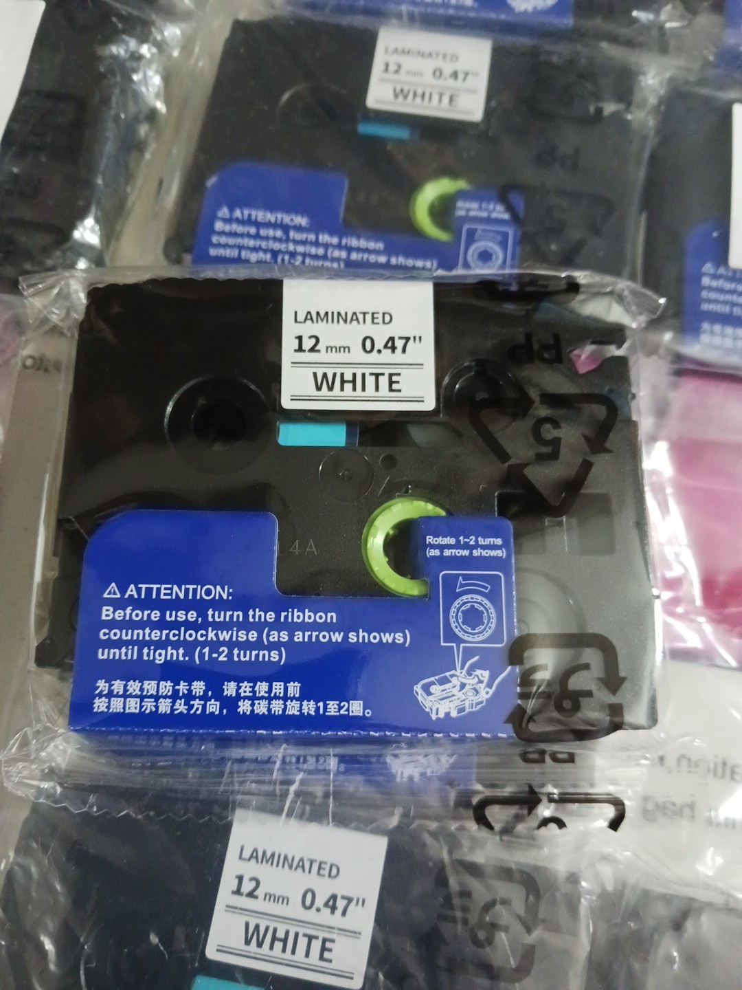 Laminated label tape 12mm 0.47″ white 231 black ink cartridge. Lot of 24 P-touch