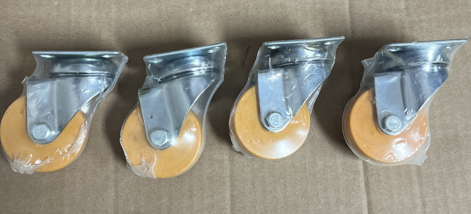 Shepherd 2 in. Honey Orange Polypropylene and Steel Swivel Plate Caster with 88