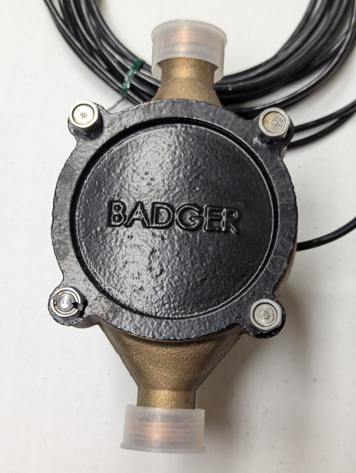 Used Badger model 25 5/8″ brass water meter with HR E lcd register