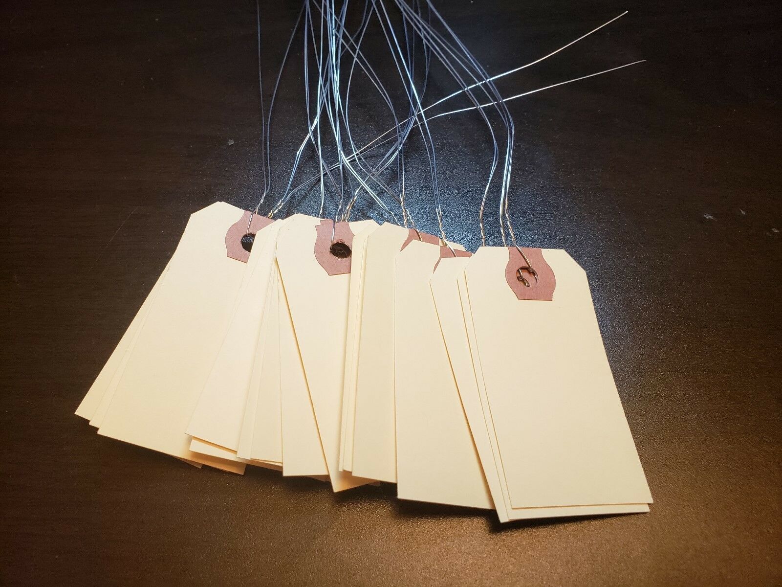 Size 1 Manila Inventory Shipping Hang Tags with Wire 2 3/4″ x 1 3/8″ Wired Tags