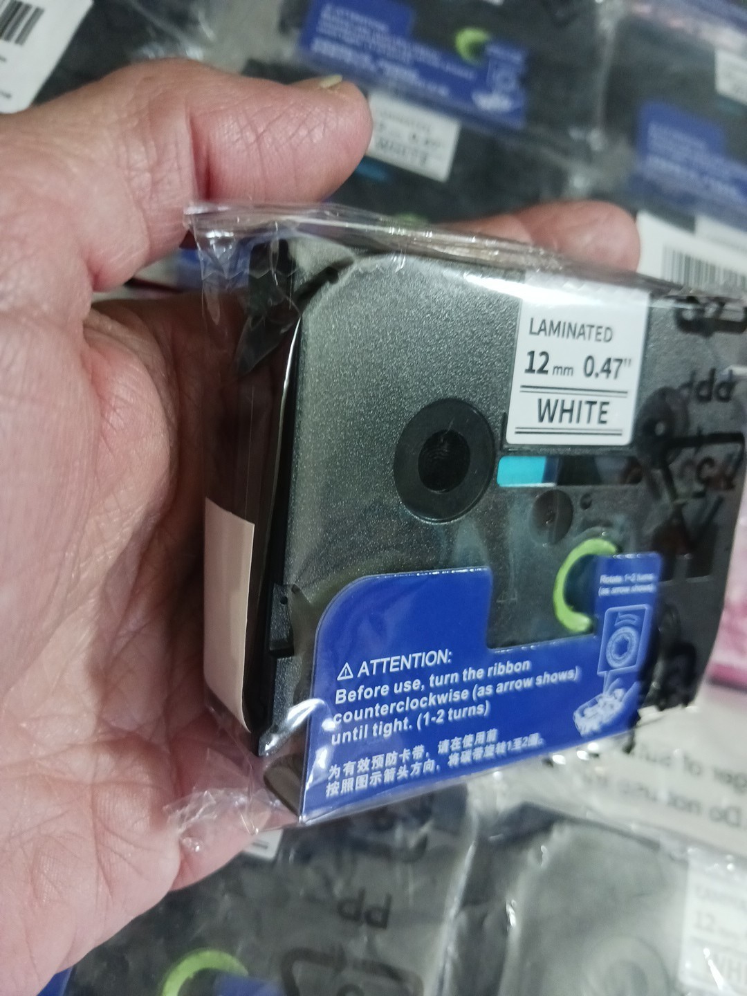 Laminated label tape 12mm 0.47″ white 231 black ink cartridge. Lot of 24 P-touch