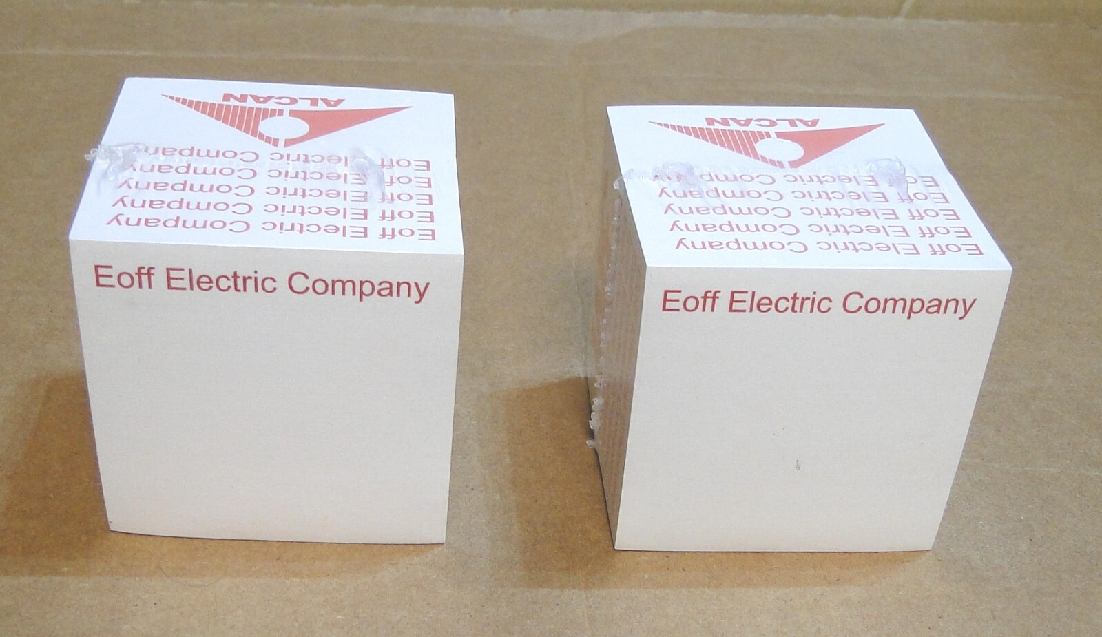 Two 3M 3×3 Post-It Notes Cubes w/Advertising: Alcan, G.E., Eoff Electric Company