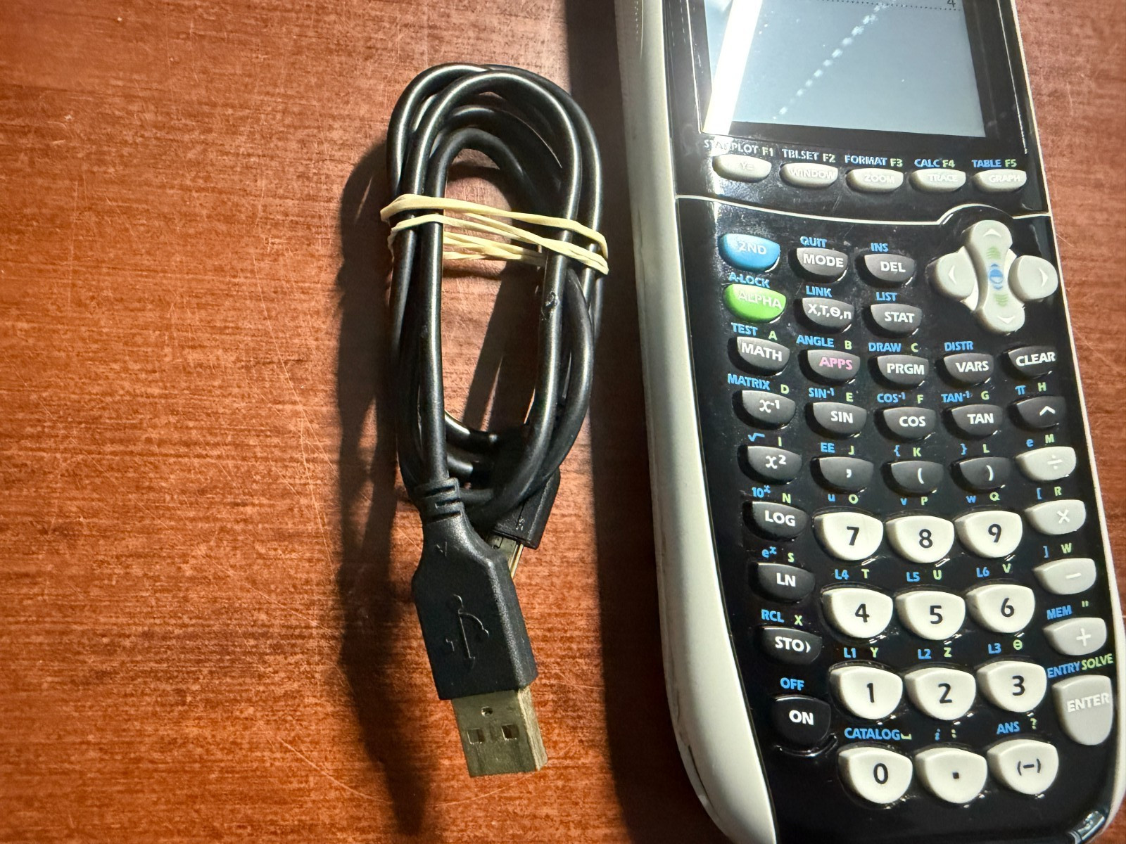 Texas Instruments TI-84 Plus C Silver Edition Graphing Calculator + Cable