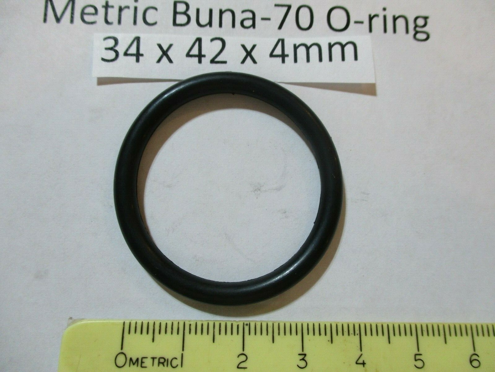 34mm ID x 42mm OD x 4mm thick O-ring. Buna-70. Quan 1.