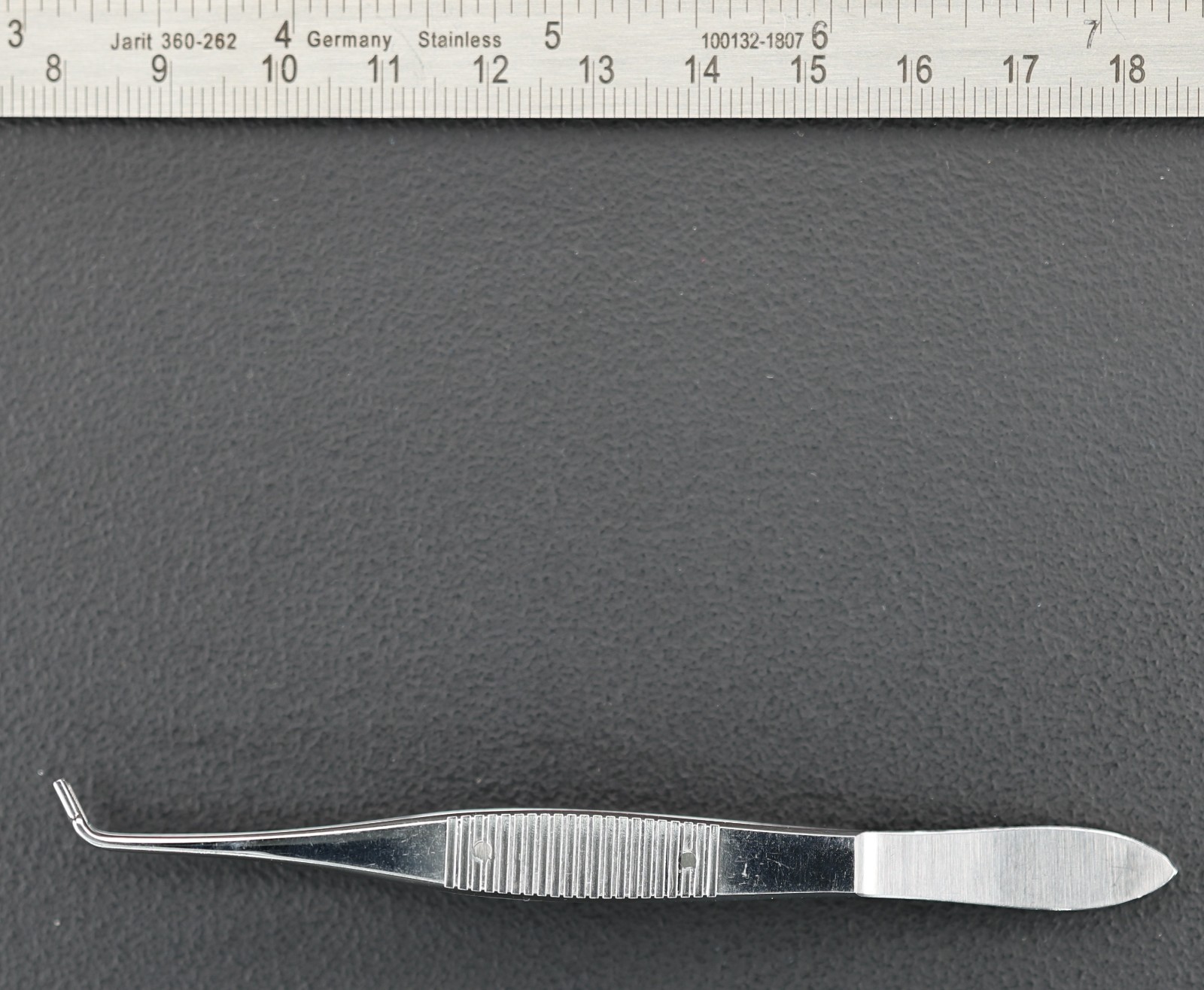 Storz E1818 Kelman-McPherson Corneal Suturing Forceps, Angled, 1×2 Teeth, 107mm