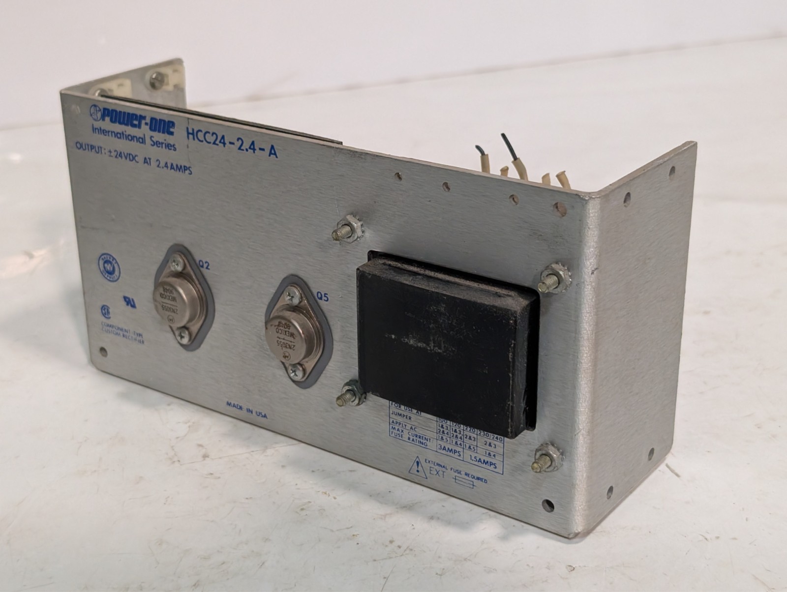 Power-One HCC24-2.4-A linear power supply +/-24VDC 2.4A, 100-240VAC as shown