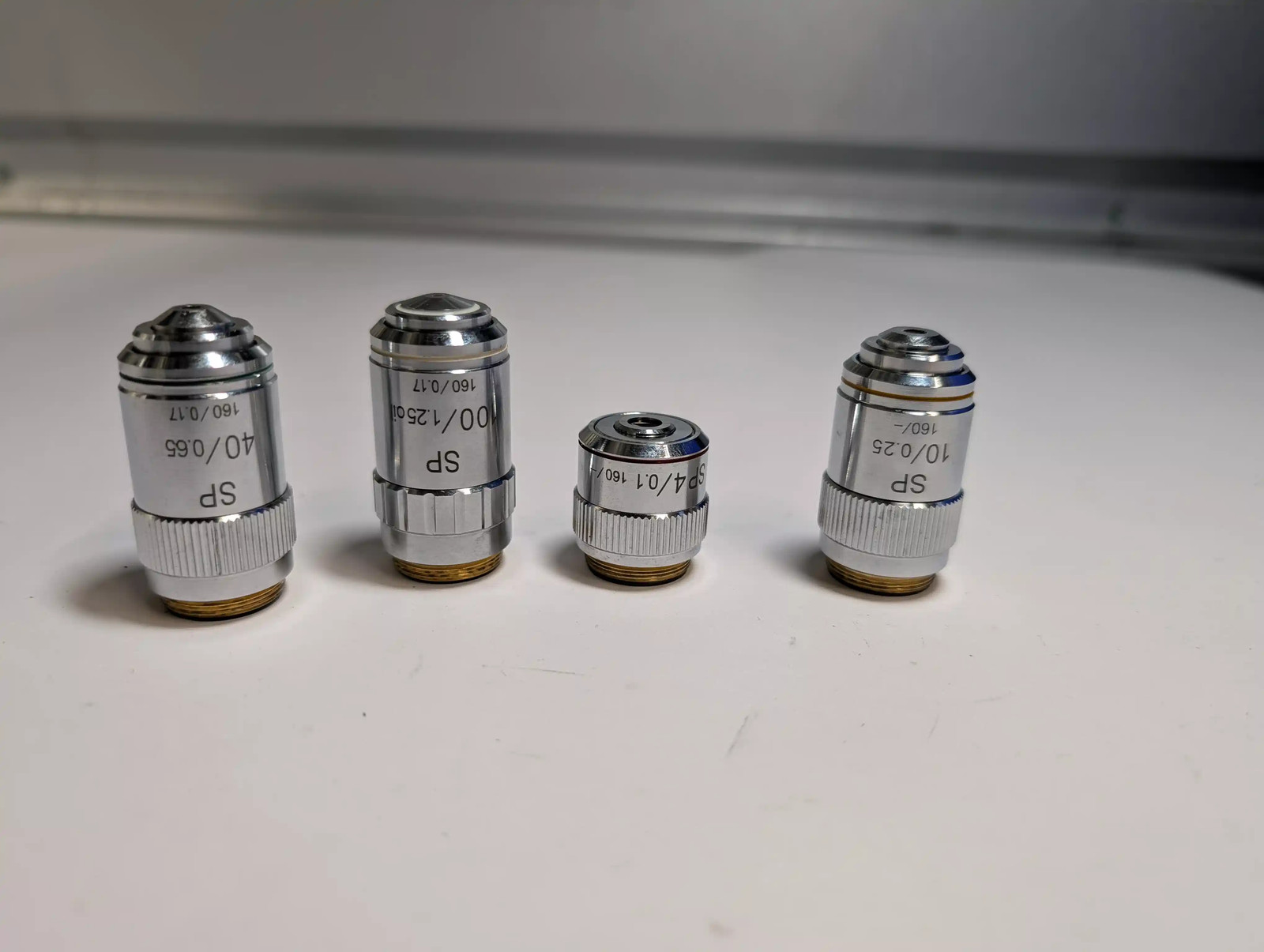Set of 4 SP Microscope Objective Lenses: 4x, 10x, 40x, 100x Oil