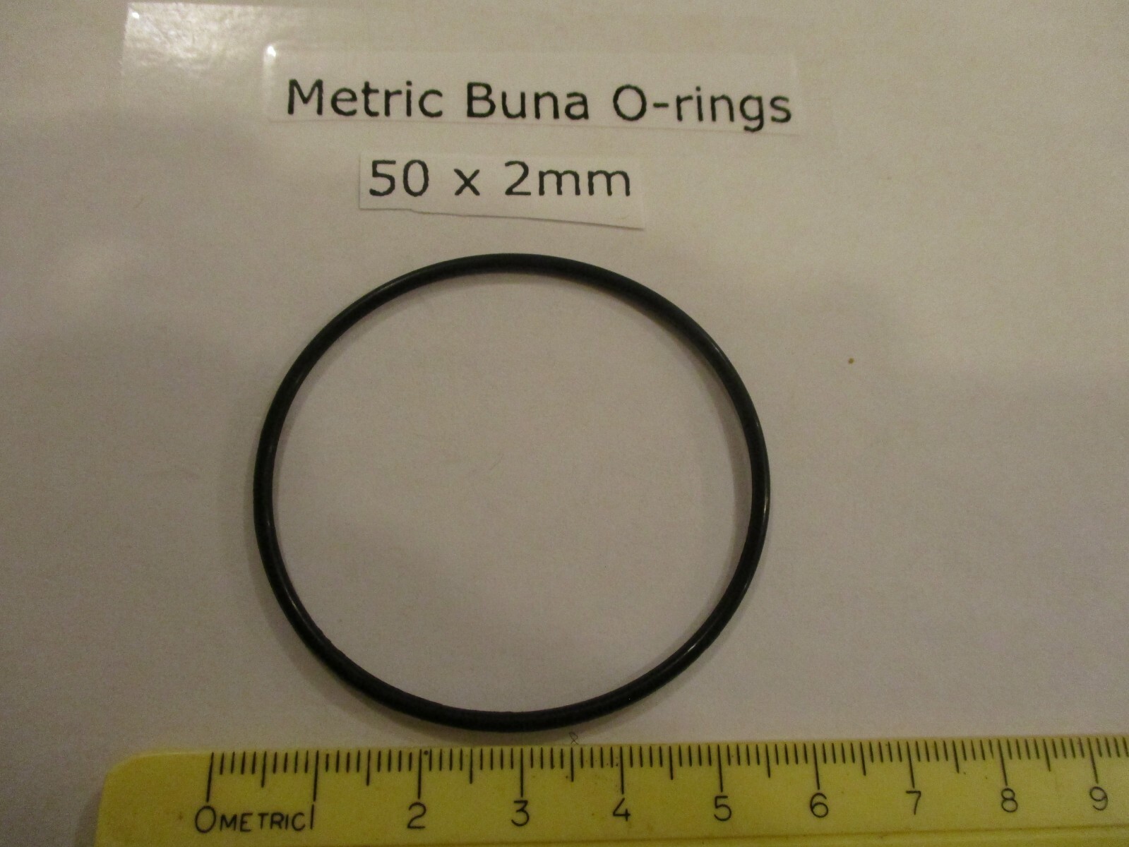 50mm ID x 54mm OD x 2mm thick O-ring. Buna-70. Quan 1.