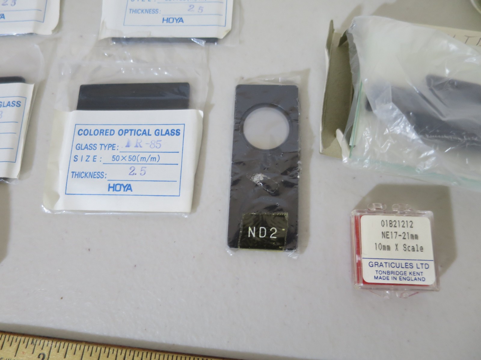 Olympus Microscope HOYA Lenses, and assorted parts. HOLLAND, AUSTRIA, UK PARTS