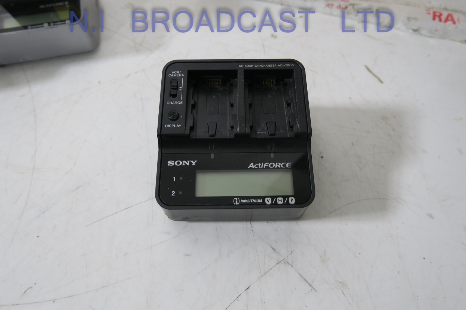 1x Sony actiforce charger with 2x lithium ion np-fh100 batteries  (26wh ) batte