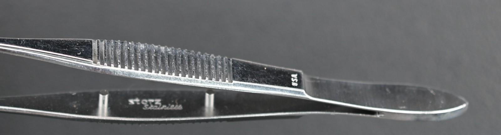 Storz E1818 Kelman-McPherson Corneal Suturing Forceps, Angled, 1×2 Teeth, 107mm