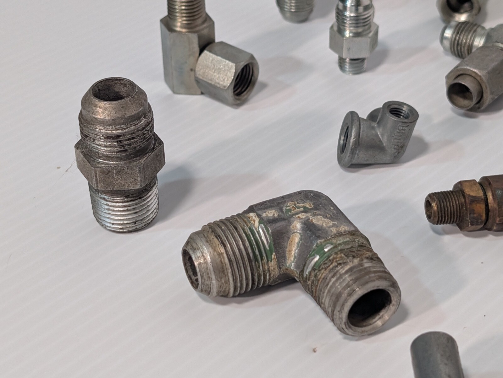Mixed Lot of Female & Male Swivel Nut Elbow & Industrial Plug Fittings, as shown