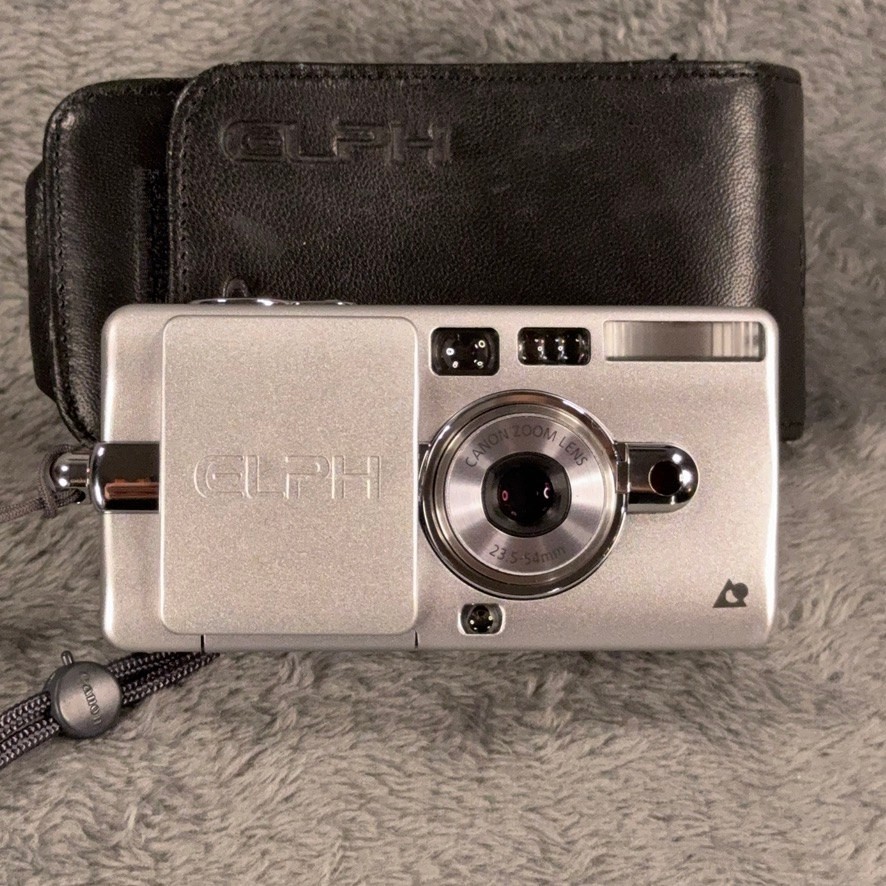 Canon ELPH Z3 APS Film Camera Silver 23.5-54mm Zoom Lens with Leather Case