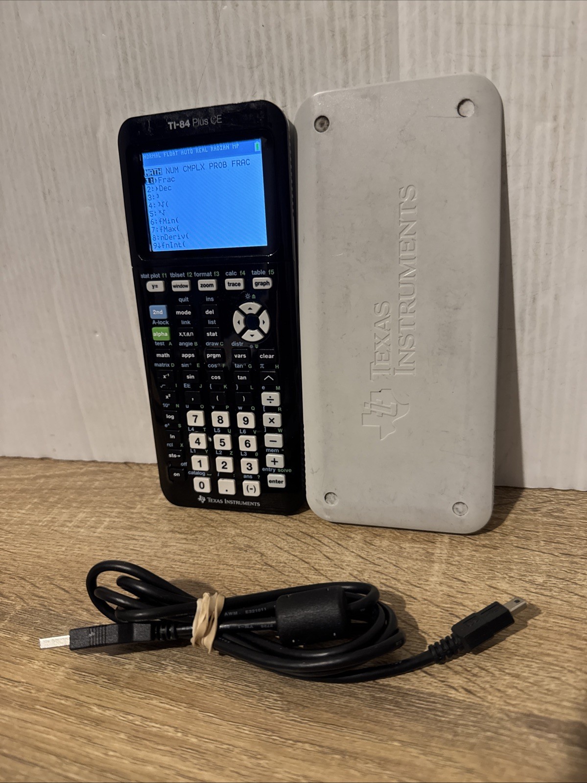 Texas Instruments TI-84 Plus CE Graphing Calculator – Black/white