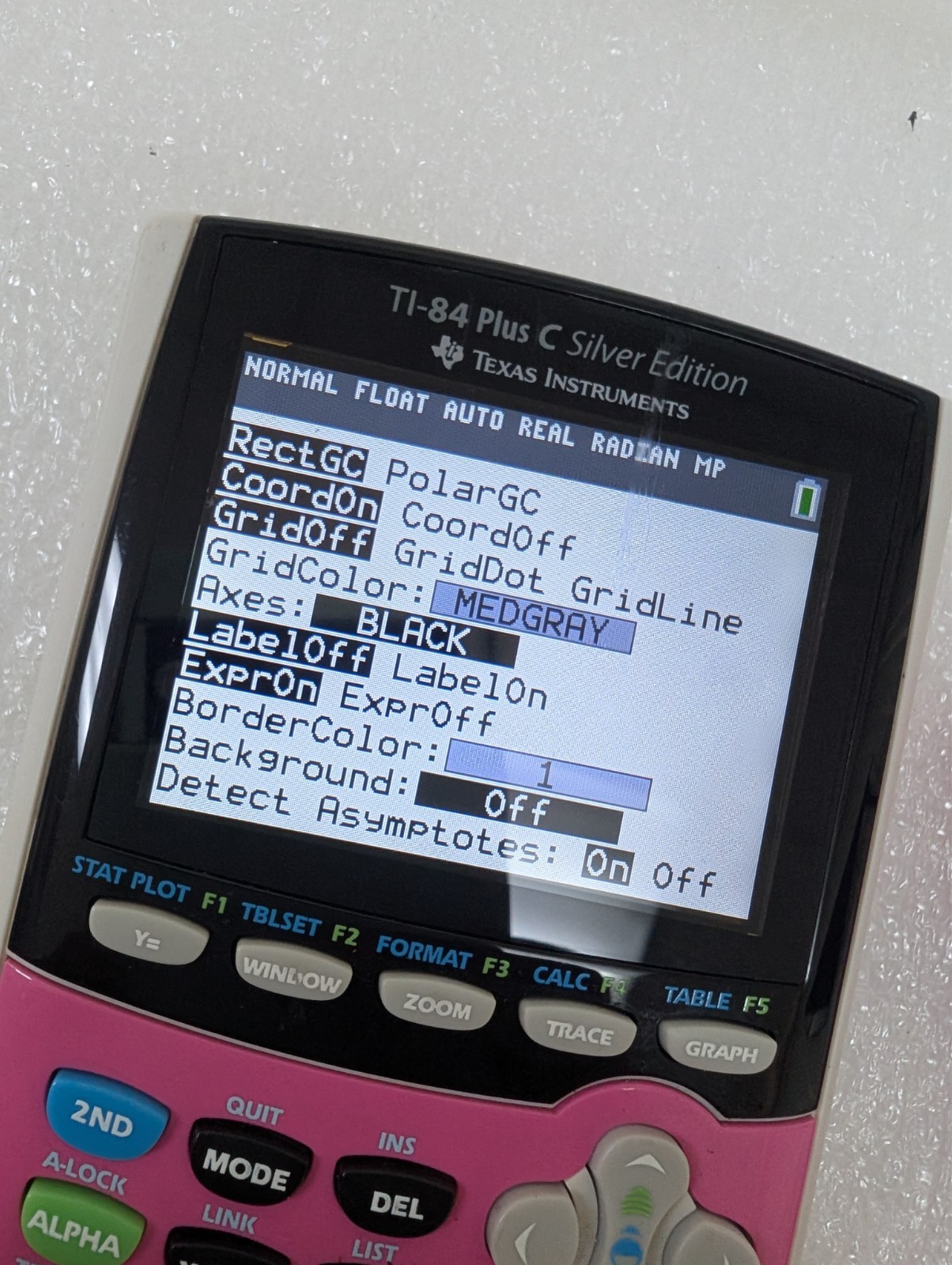 Texas Instruments TI-84 Plus C silver edition Graphing Calculator w/ pink cover