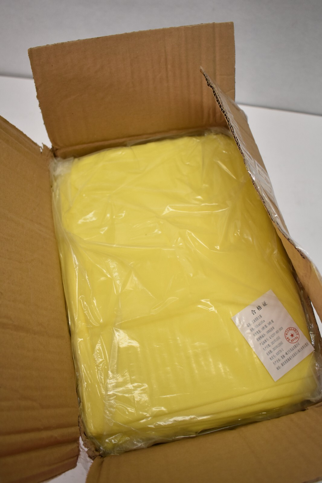 Lot of 50 Diamond Disposable Non Woven Gowns ISLGND Exp 12-2025 Yellow