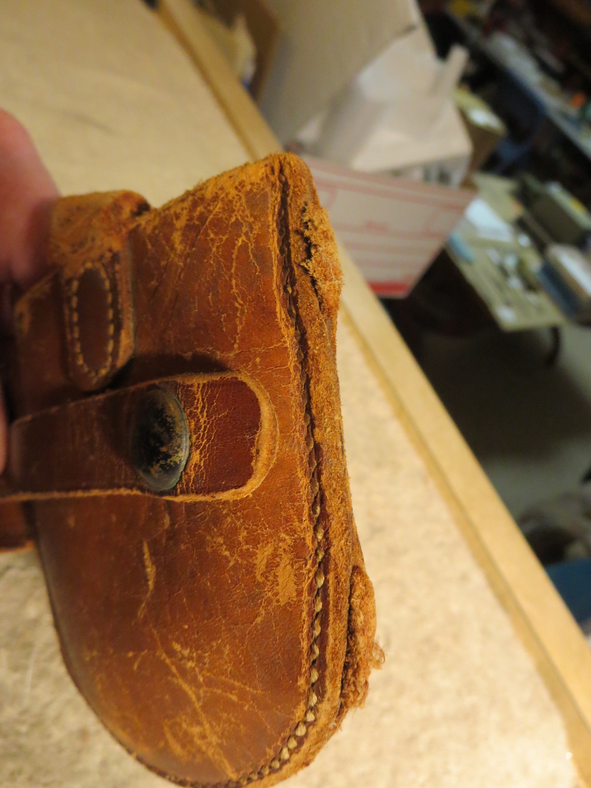 4 handcuff cases: 3 brand names in excellent cond. 1 older, modified, no name.